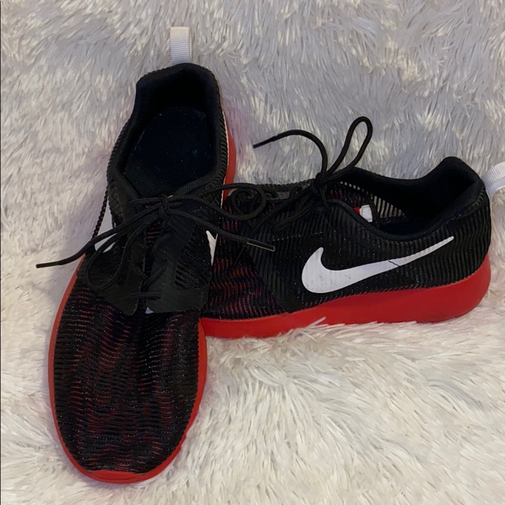 Red and black nikes
